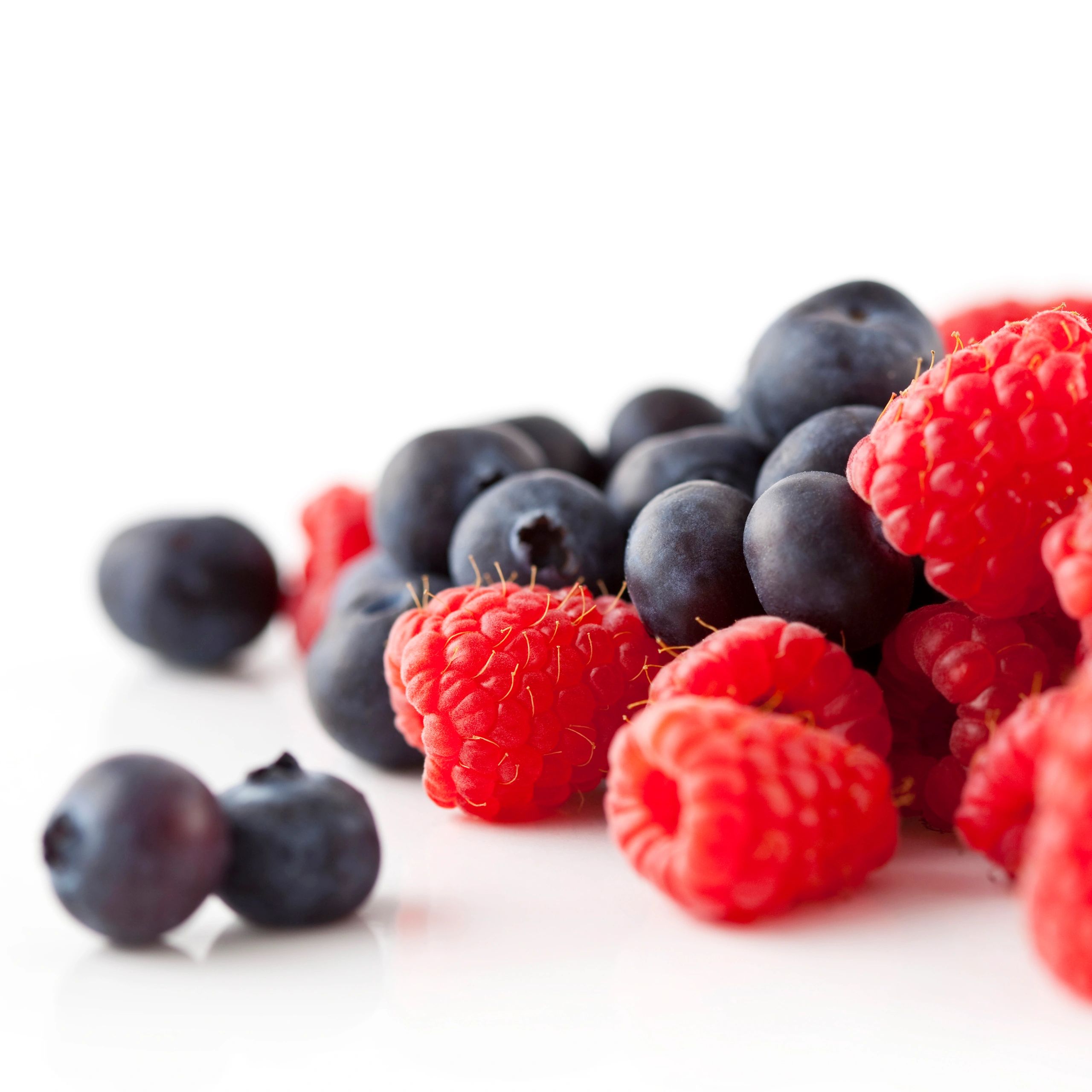 Raspberries and blueberries close up